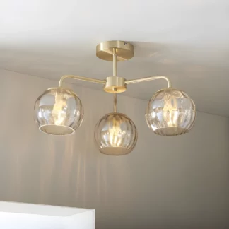 Lampa Dimple nad stolik w salonie