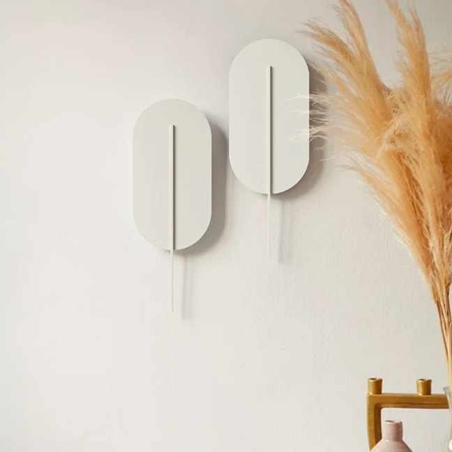 Kinkiet ścienny Rokke biały – minimalistyczny design i nastrojowe oświetlenie