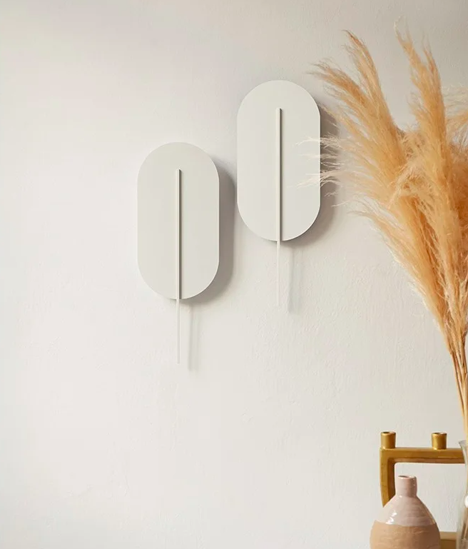 Kinkiet ścienny Rokke biały – minimalistyczny design i nastrojowe oświetlenie