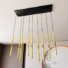 Nowoczesna czarno‑złota lampa wisząca Selter 9 z dziewięcioma źródłami światła G9